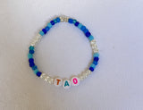 The ‘Mini Pearl' Blue Lagoon Personalised Name Bracelet with multi coloured beads (made to order) - Petite Chou