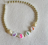 The ‘Silvie’ Pearl Personalised Name Bracelet (made to order) - Petite Chou